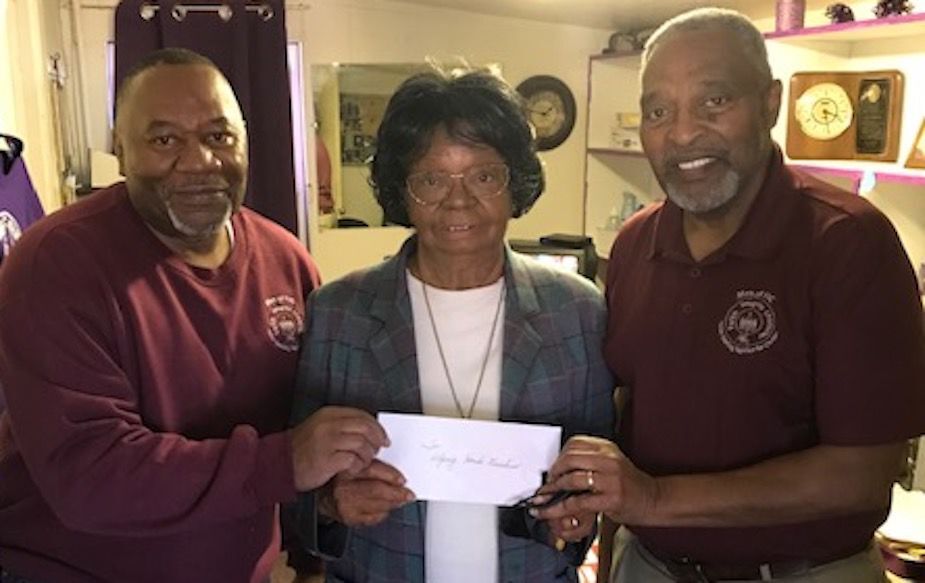 Men of FIC support Christmas food giveaway